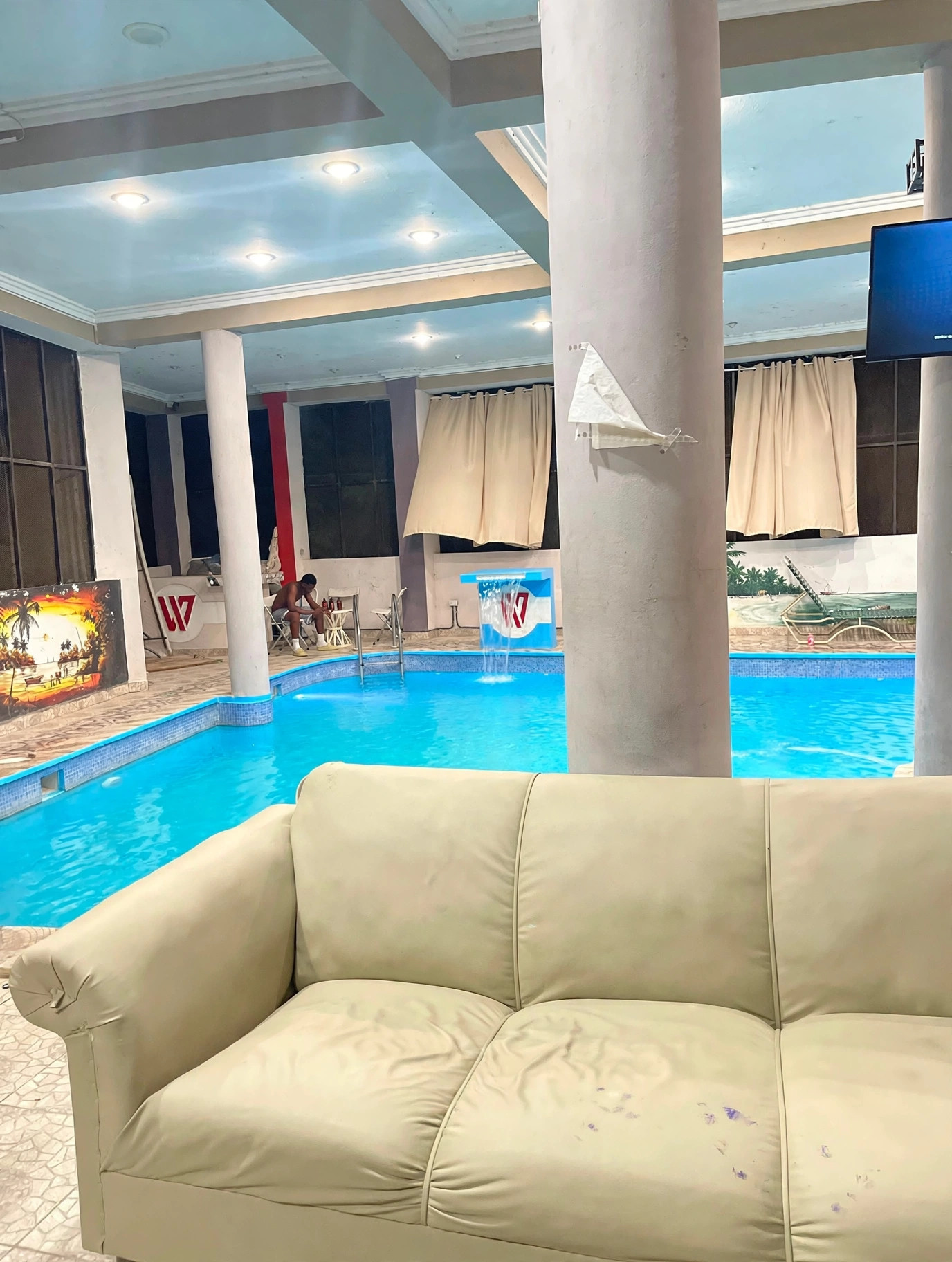 Indoor pool and poolside lounge